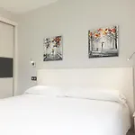 Puerta De *